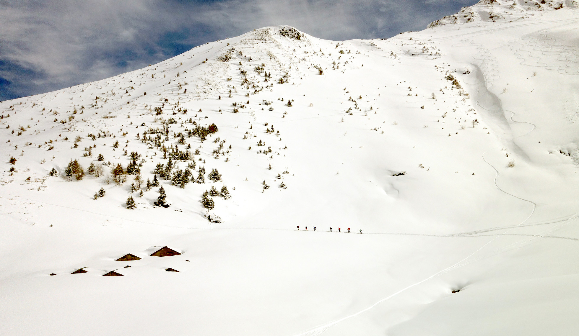 Fast and Light magazine photo Tim Barnett skiing powder snow